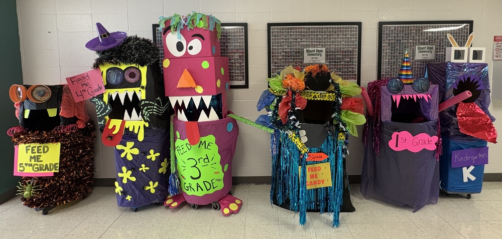 "Monsters" collecting candy for Trunk or Treat
