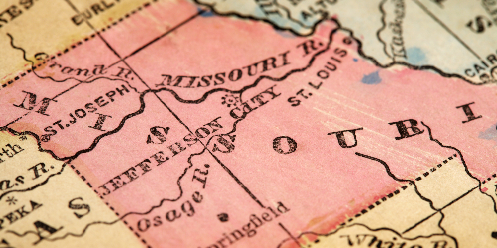 Colorful retro map zoomed in on pink shaded state of Missouri