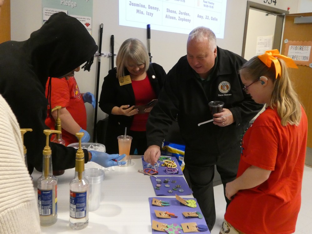Legislators shop the crafts created by the Enterprise Class at Mike Clemens Center