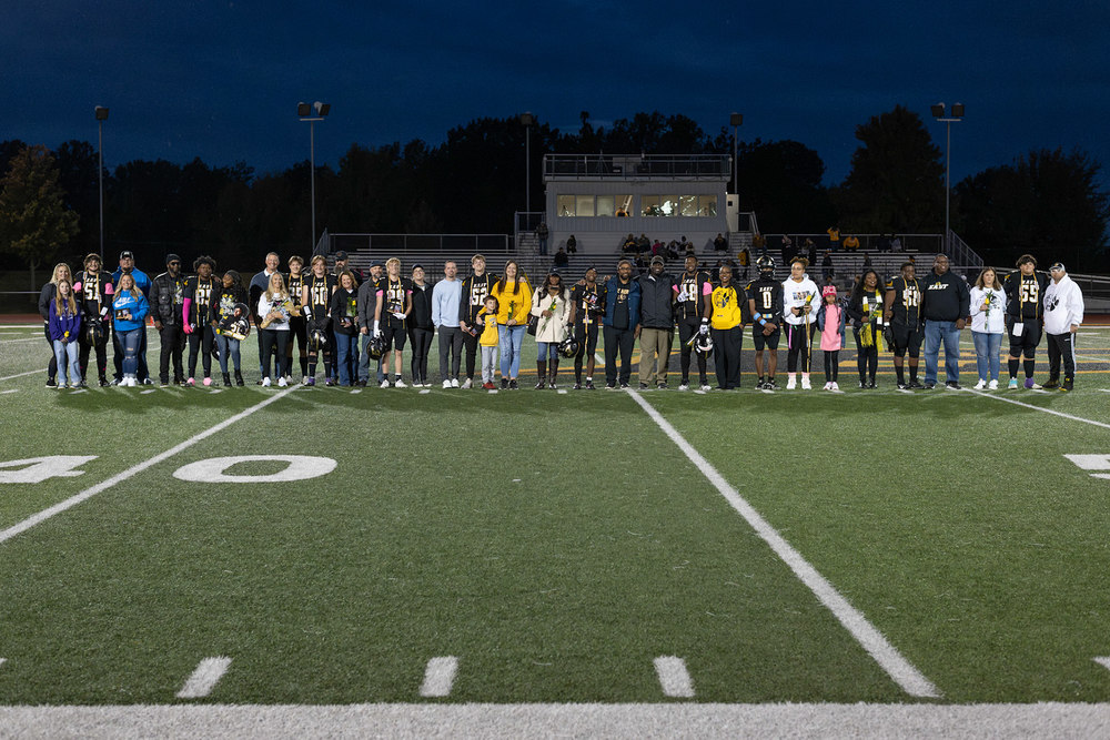 FZE Football Seniors and Families at Half