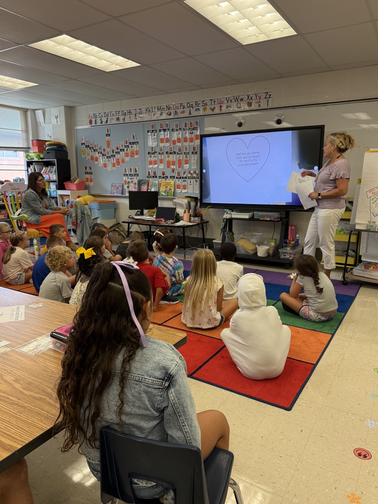 Mrs. Martin giving a counseling lesson to a 1st-grade class