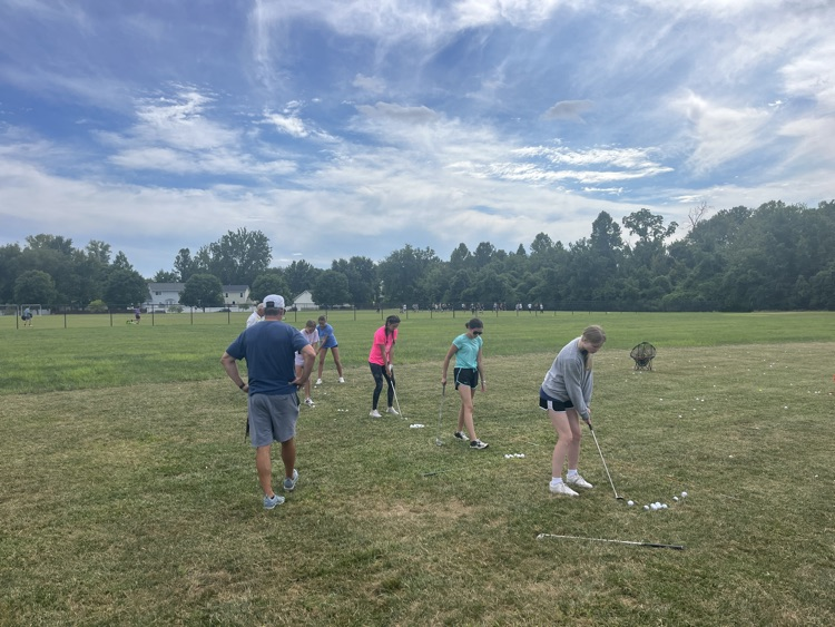 Coach Hawkins giving chipping lessons