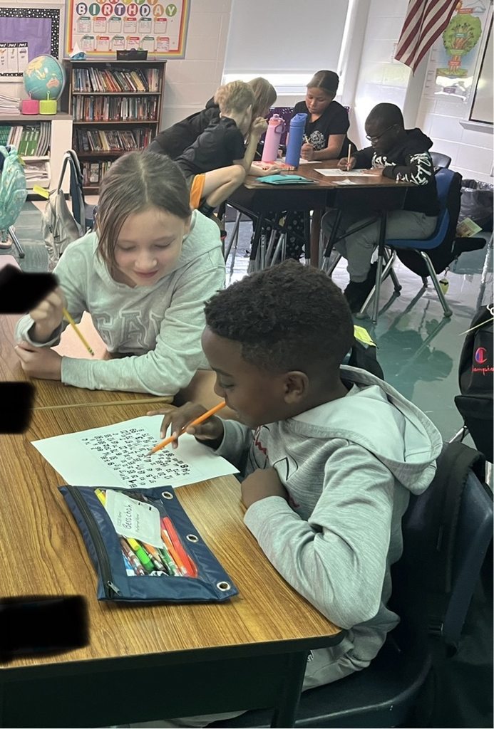 two students working in a partnership
