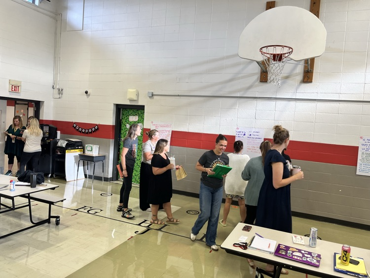 teachers meeting and discussing math standards