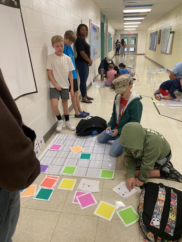 Students figuring out the Indi challenge puzzle