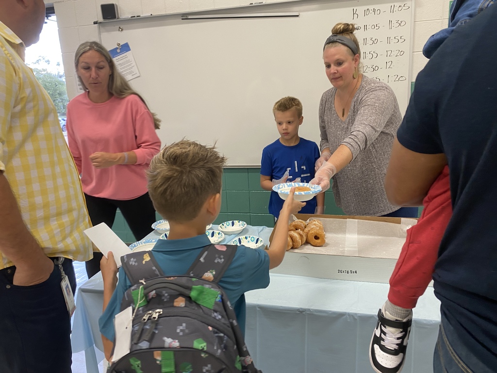 Our wonderful volunteers handing out our doughnuts