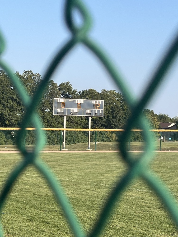 The scoreboard with a 12 - 0 score posted