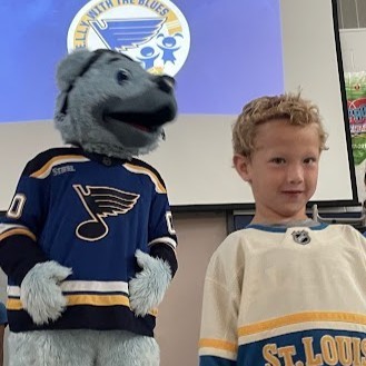 Louie and a student wait to start an exercise