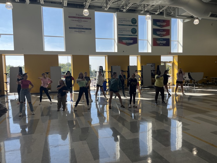 Pride pack practicing their moves for Friday