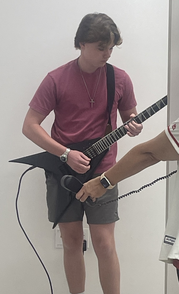 Logan playing national anthem