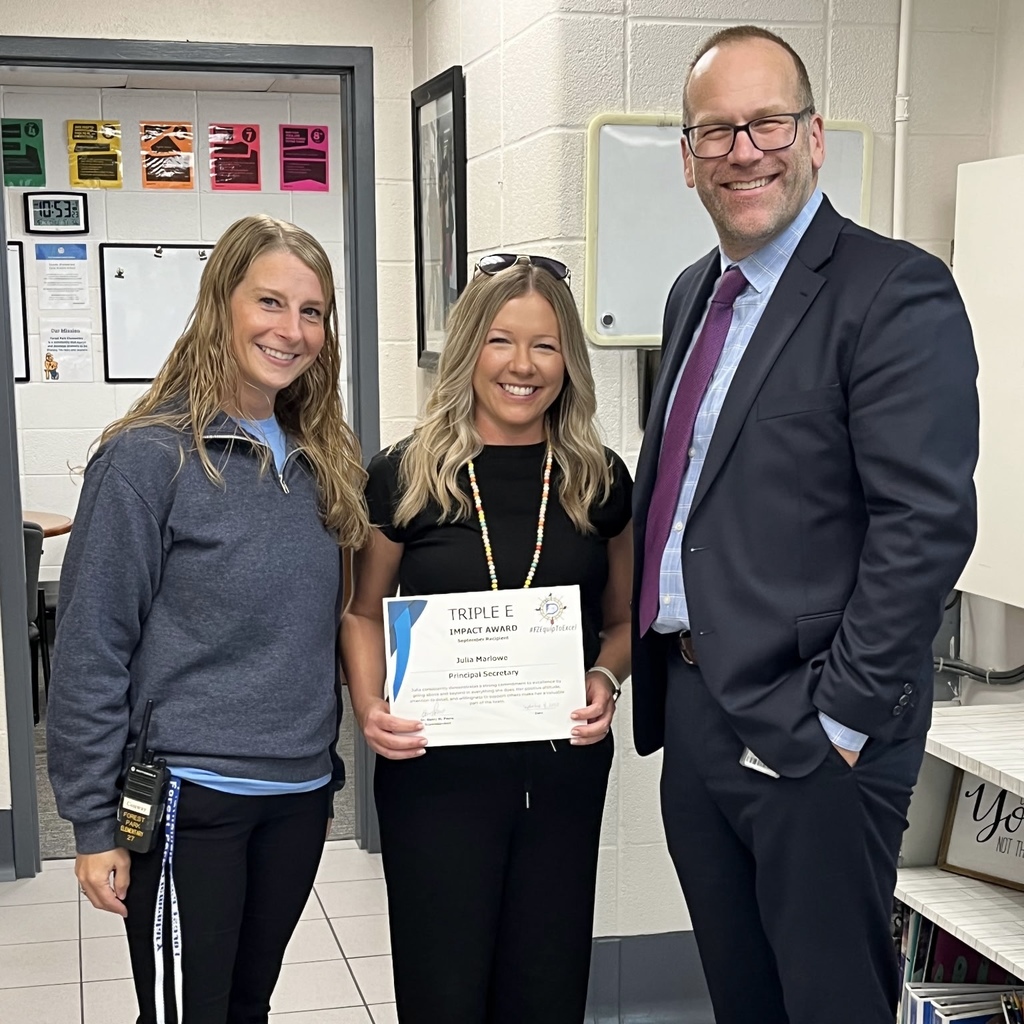 Dr. St. Pierre and Dr. Conway presenting the Triple E Impact Award to FPE Office Professional Julia Marlowe