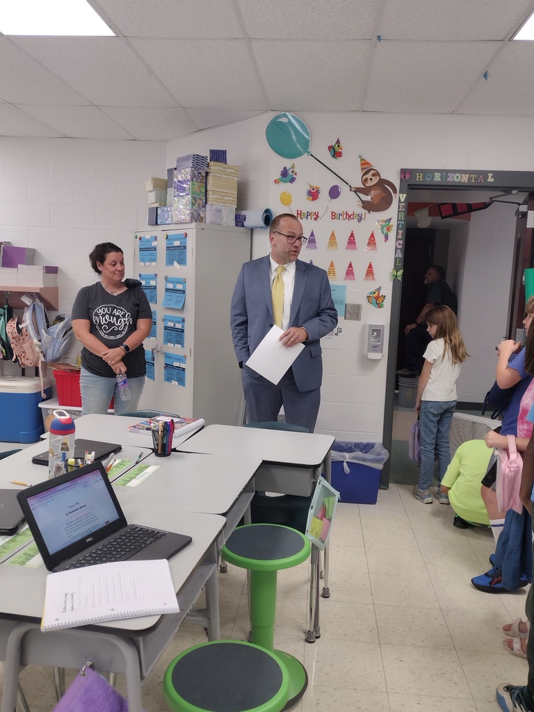 Dr. St. Pierre presenting Triple E Impact Award to PPE Teacher Amy Gourley