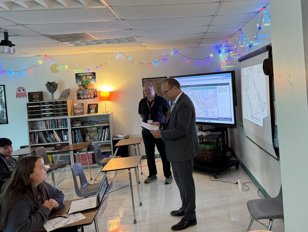 Dr. St. Pierre presents award to Mr. Siemons