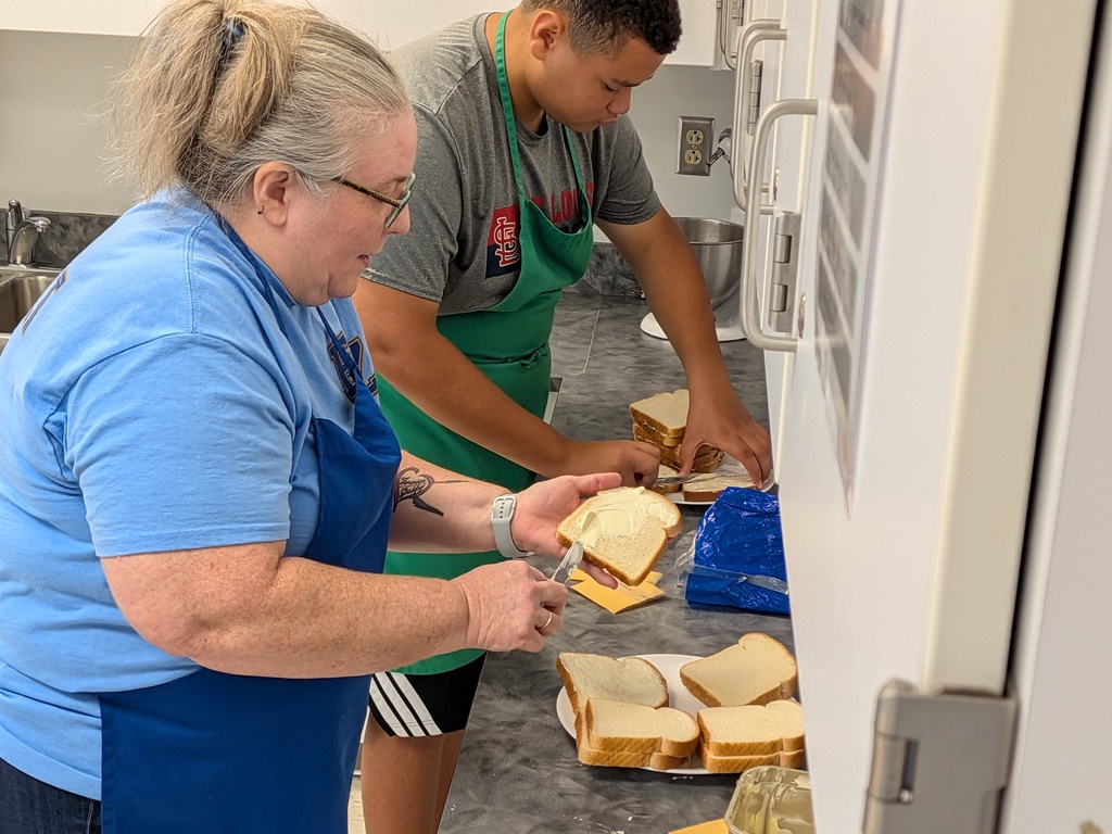 During 4th hour today, Ms. Trost’s Enterprise class was busy preparing food for this week’s luncheon. Throughout the semester, students, paraeducators and staff plan and prepare meals. The class serves as a valuable tool for students to learn life skills through food preparation.