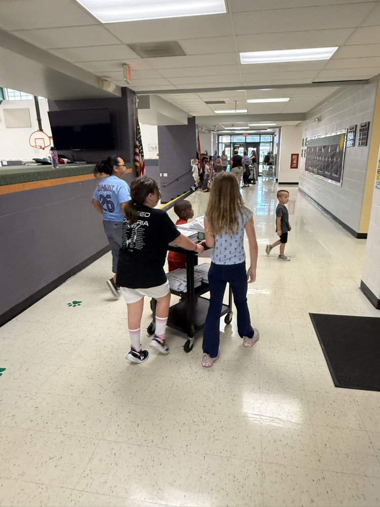 delivering copies to teachers from the copy room
