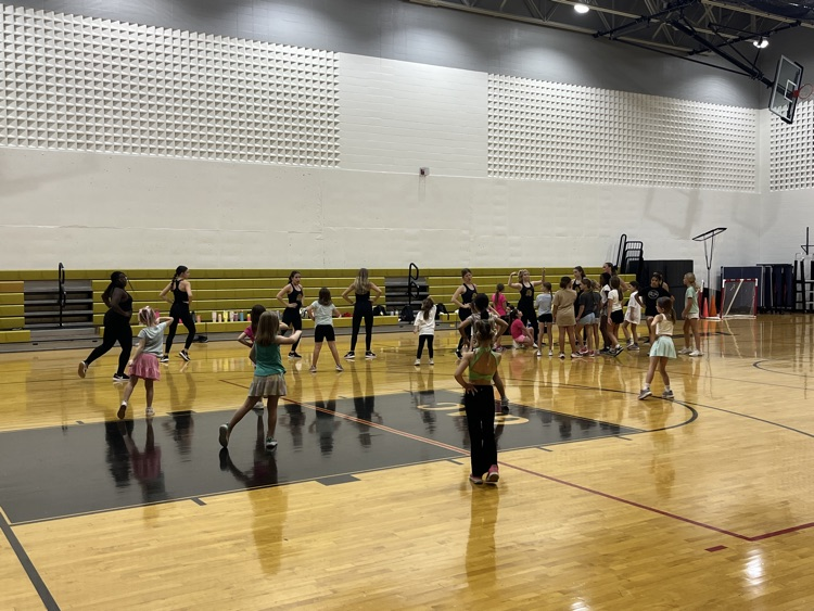 Junior Lion dancers learning their routine for October 16