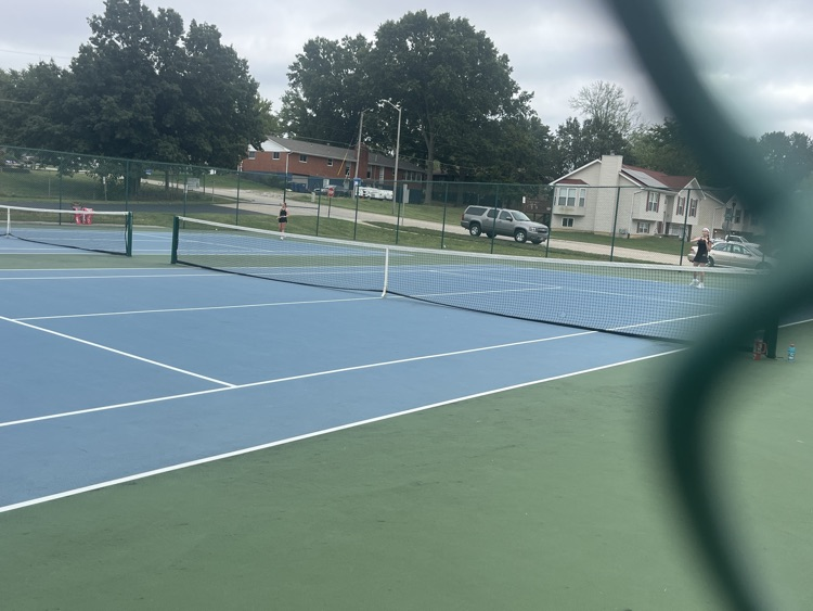Rowan and Jessica playing in singles matches