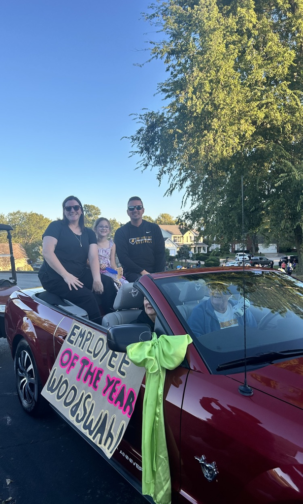 Caitlin Woodswahl and Steve Loutzenhiser leading the parade