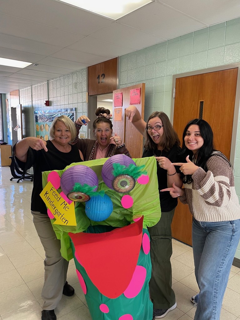 Kindergarten teachers with their monster trash can