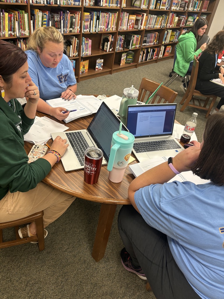 4th grade teachers collaborating to learn the new ELA curriculum