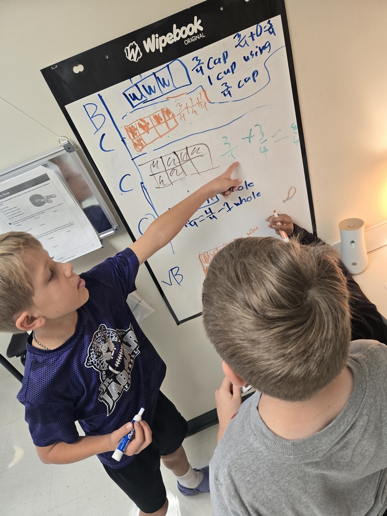 4th graders explain their thinking to solve math problems.