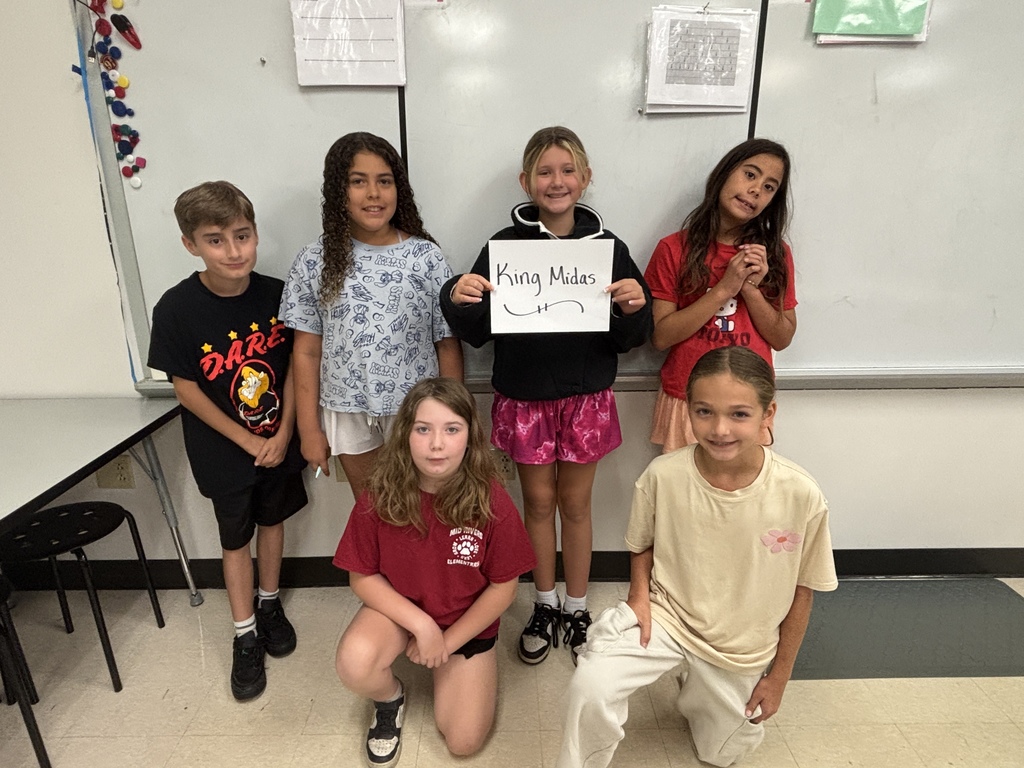 5 4th and 5th graders posing with their drama they will perform- King Midas