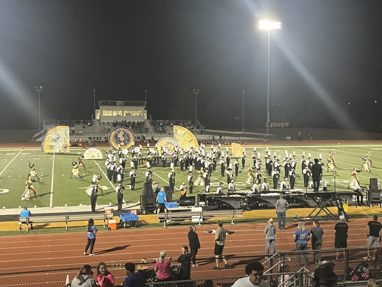 Marching band performing at half
