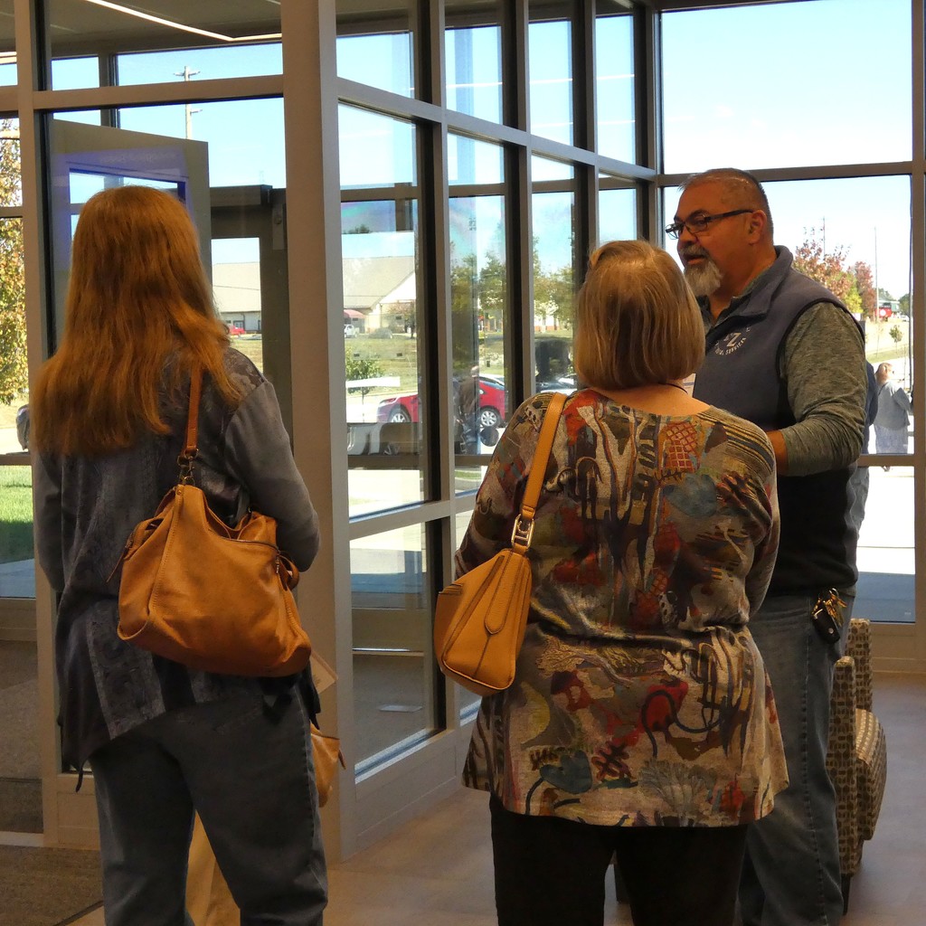 On their way out, guests visit with custodial manager to learn more about working as subs