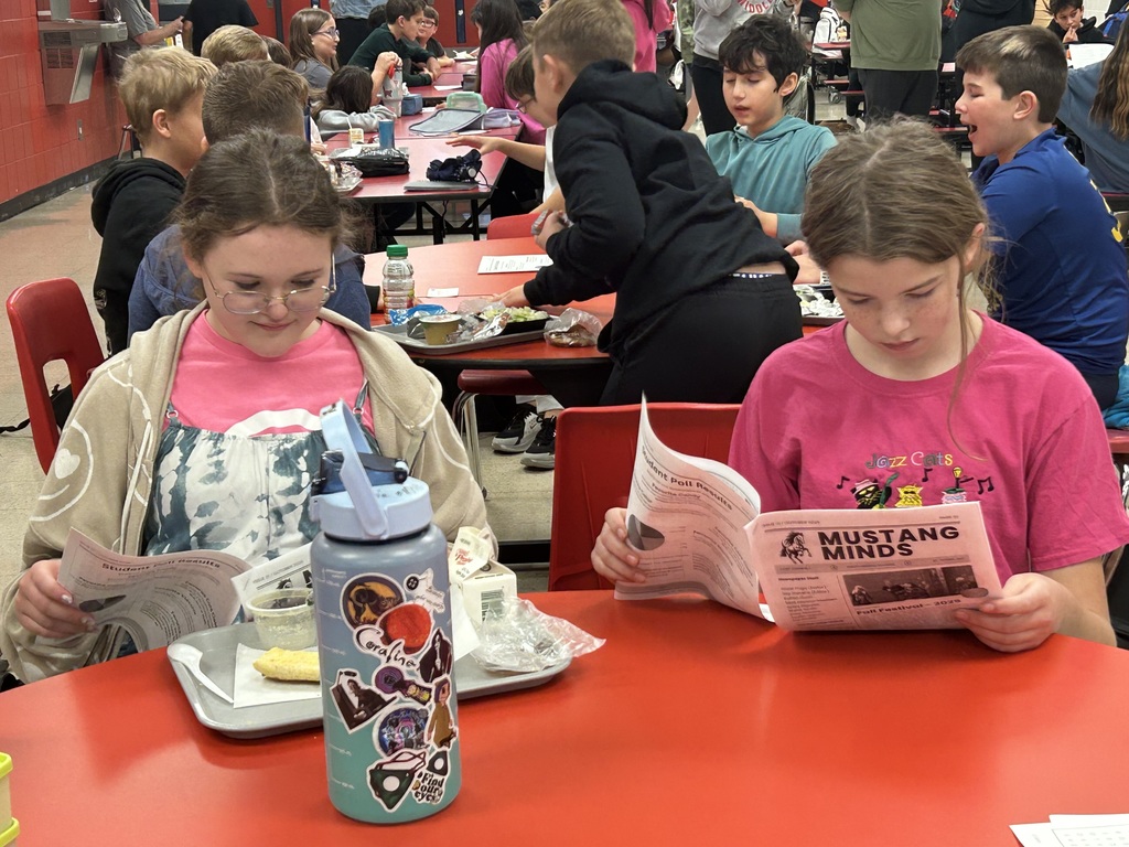 Extra! Extra! Read all about it! The SMS Newspaper Club is distributed their latest edition at lunch today! Students and staff picked up a copy to read what our Mustang journalists have been working on!