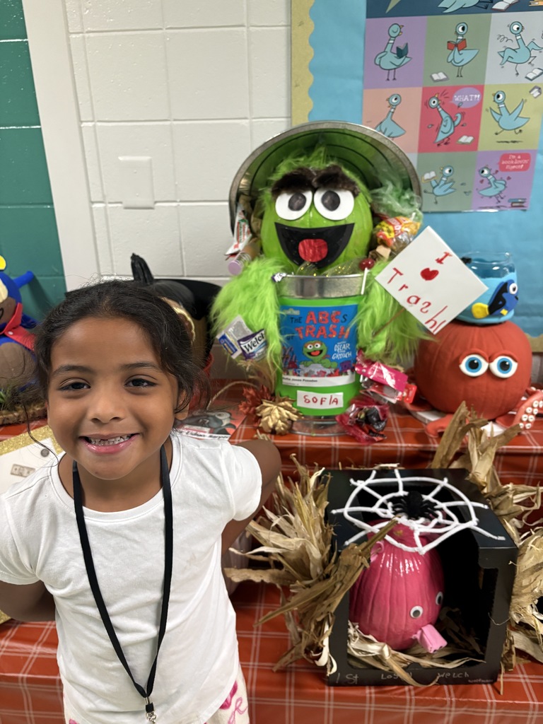 3rd place winner Sofia with her pumpkin