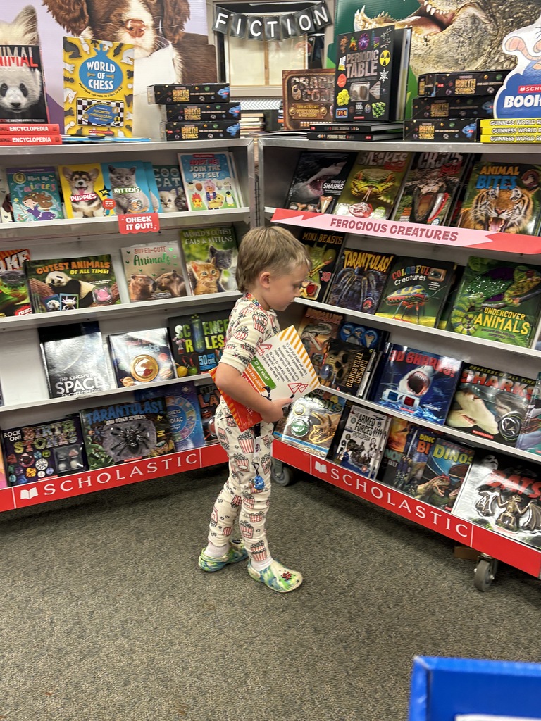 Phoenix using his $50 shopping spree prize!