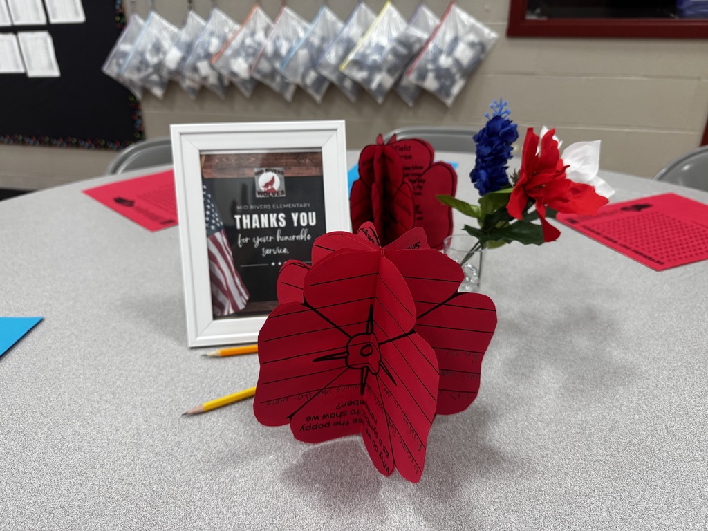 Center pieces for tables at breakfast. In a picture frame there was a sign that said: MRE Thanks Yoy for your service.