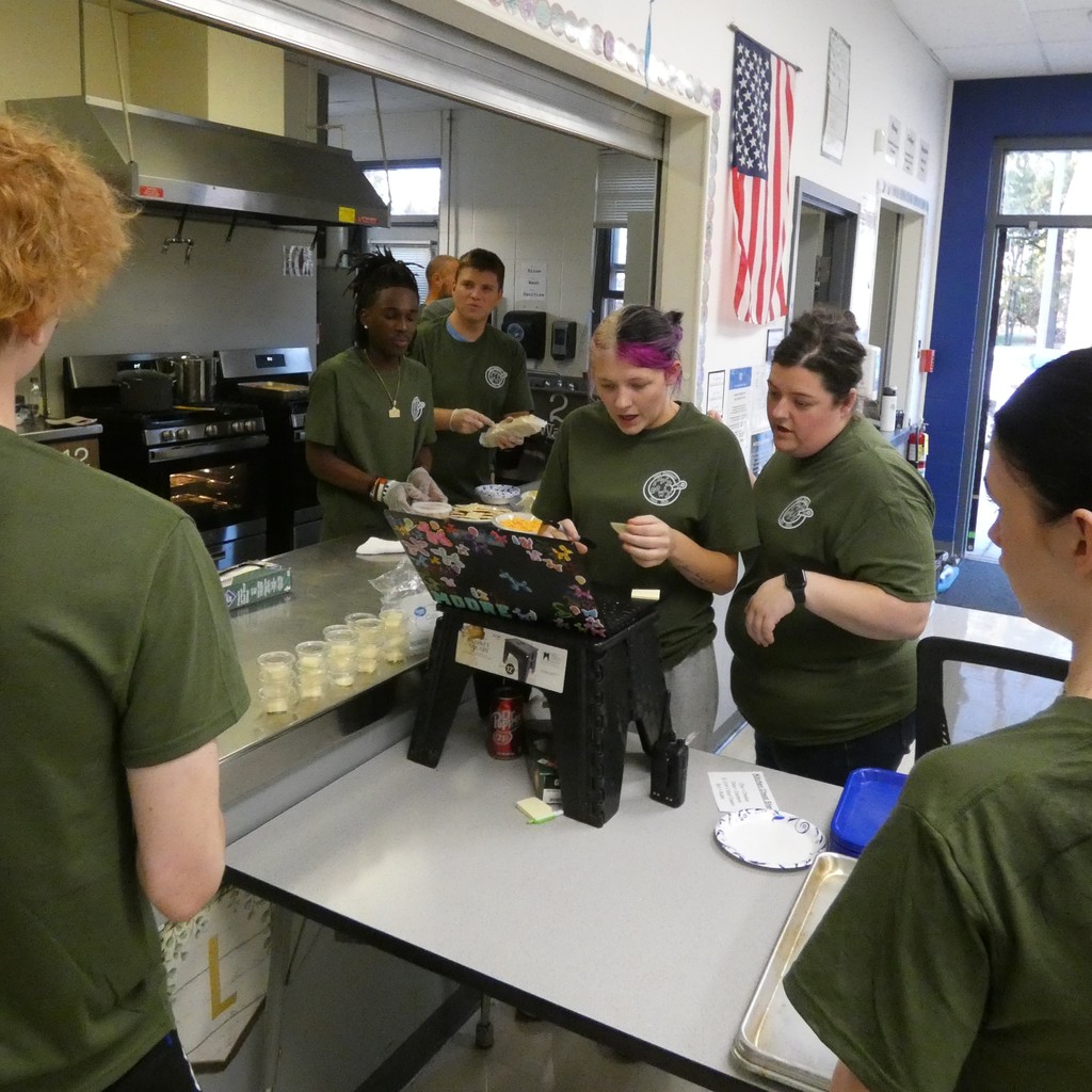 All hands on deck as staff and students fill orders in the kitchen