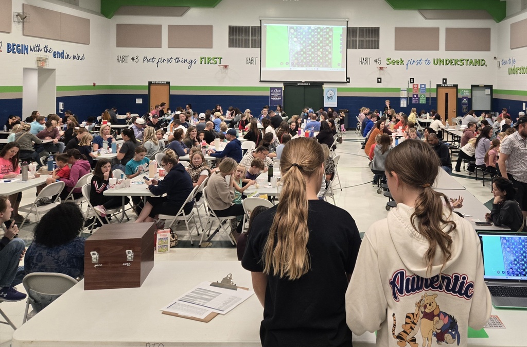 5th graders call bingo at OES PTO Bingo night.