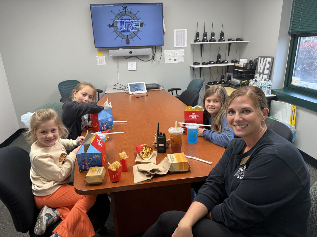 Lunch with the principals for the top fundraising family for the Fun Run!