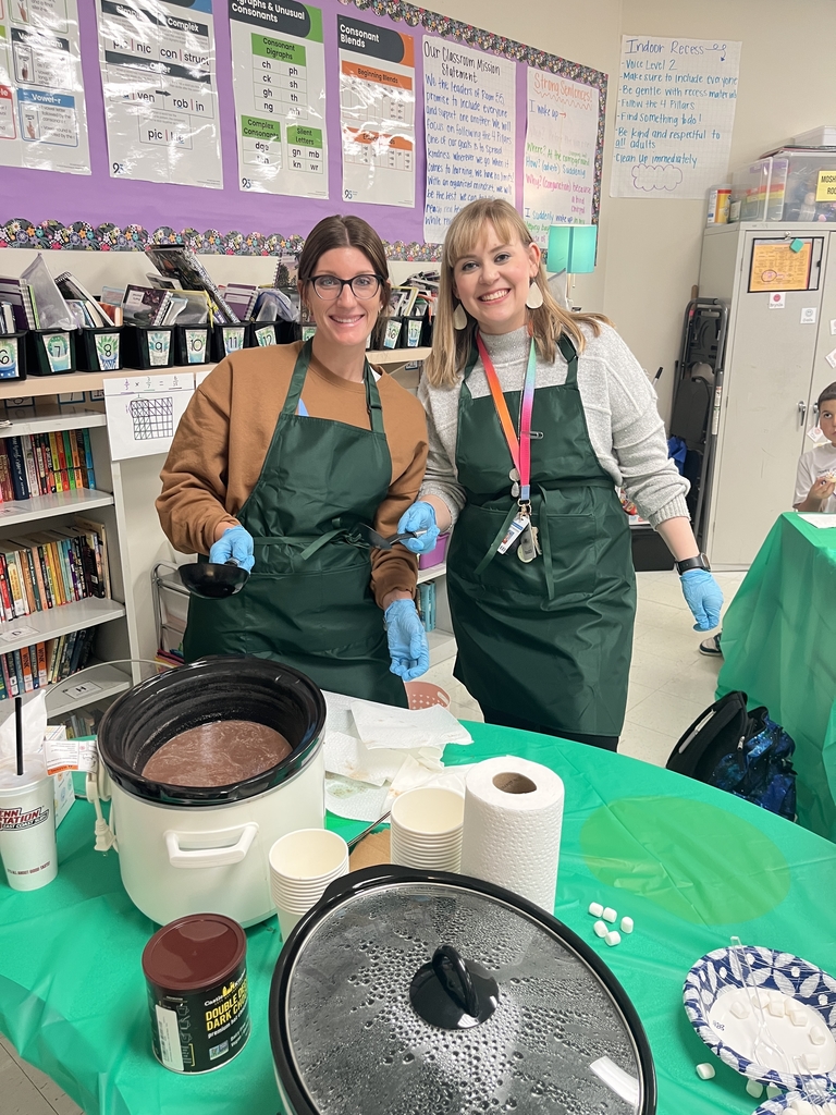 Mrs. Sorensen and Miss Moshkowsky serve hot chocolate at StarBooks poetry slam