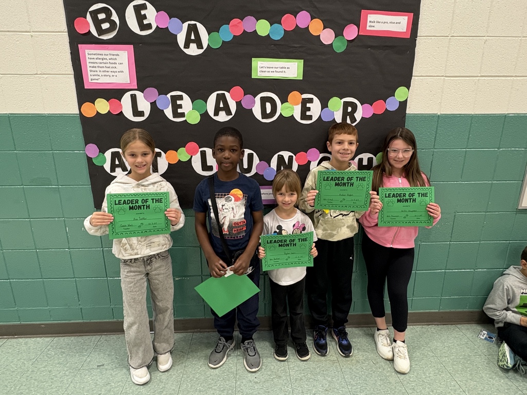 Students with their Specialist's Leader of the Month Awards