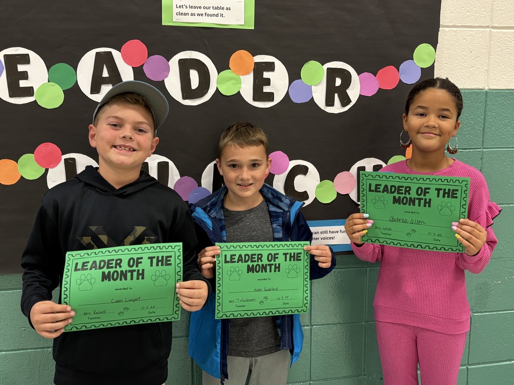 4th-grade students with their Leader of the Month Awards