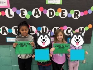 Kindergarten students with their Leader of the Month Awards