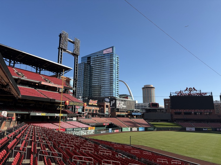 stadium view with the St. Louis skyline. buildings, the arch, etc