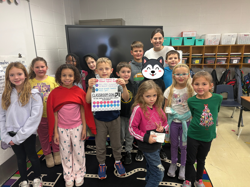 Mrs. Stephens' class with their goal chart