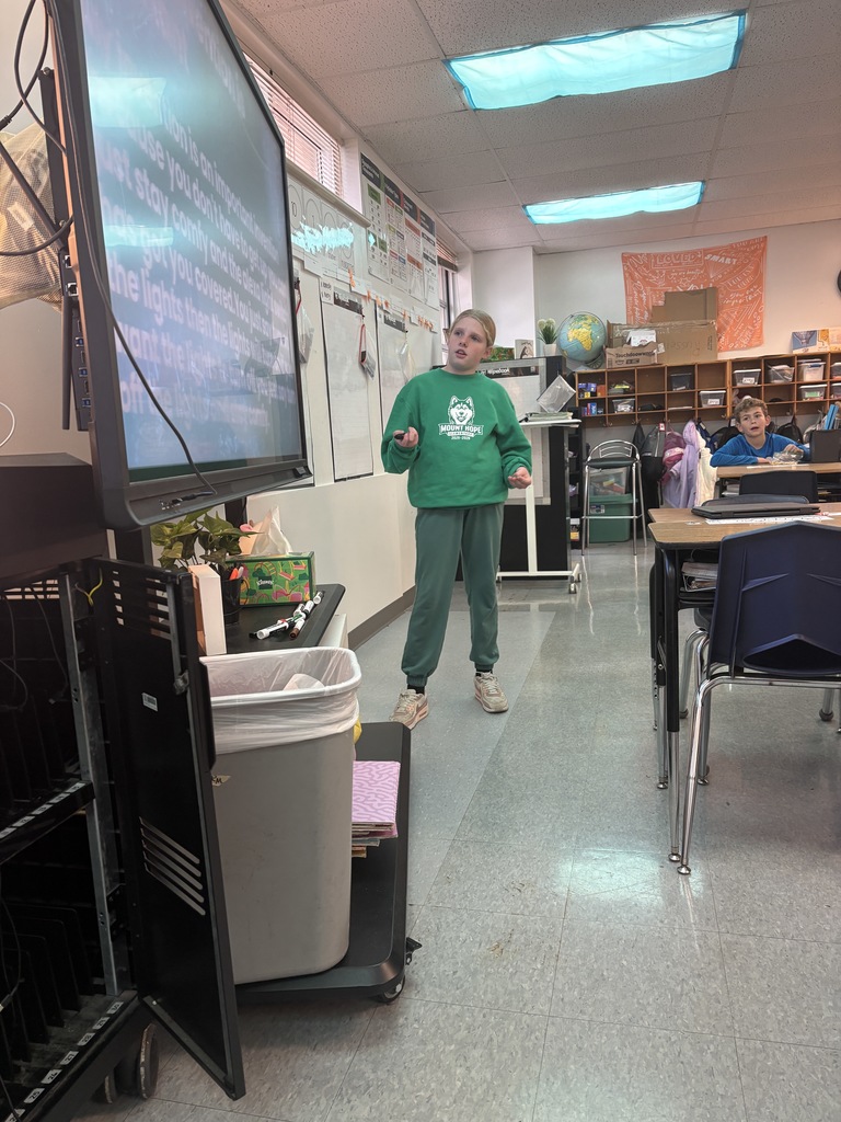 Kinsley presenting her idea to the class