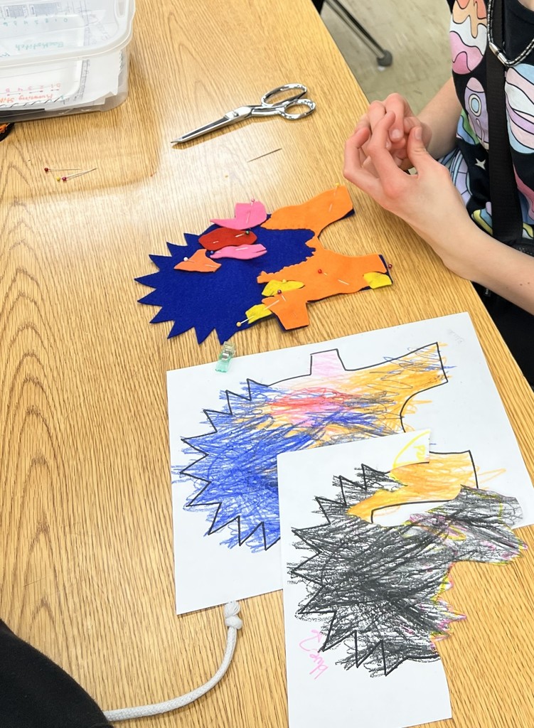 8th grade FACS students are hard at work using their hand sewing skills to make PSE kindergartners monsters come to life! 