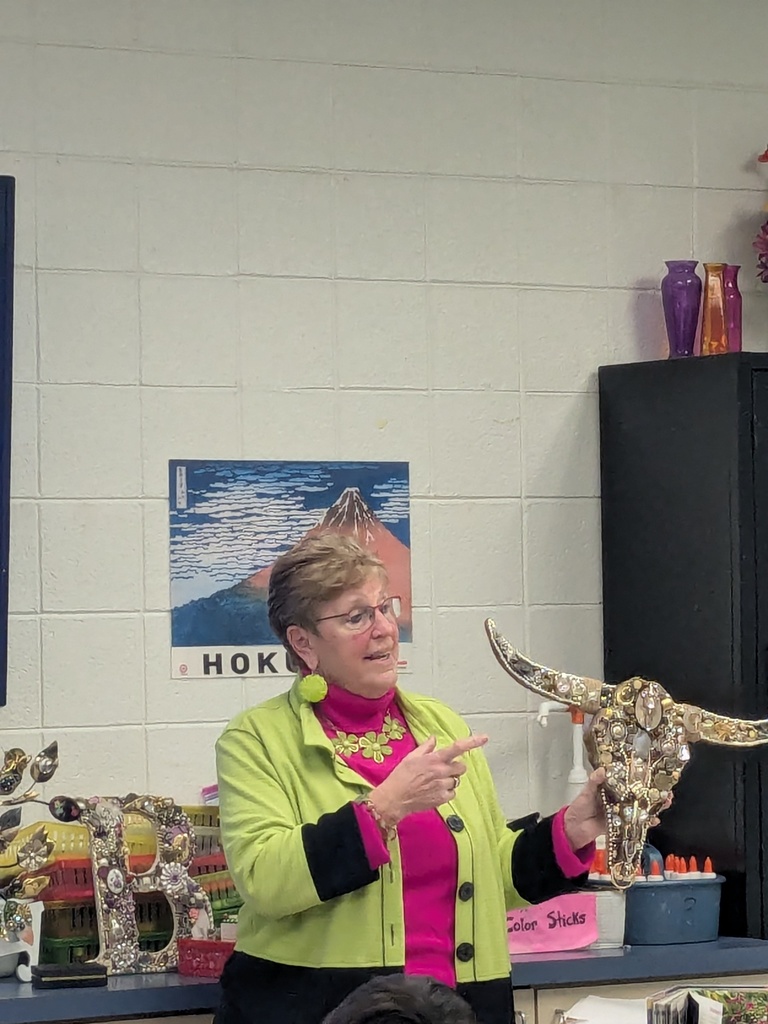 Art club guest shows example of her work