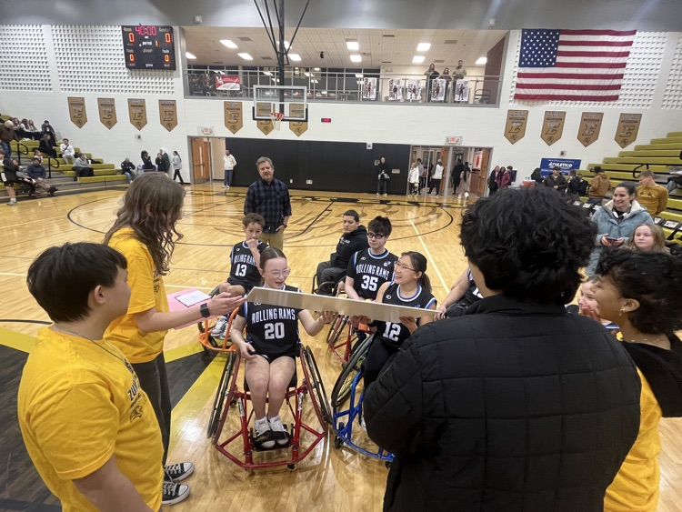 Theresa presenting the check