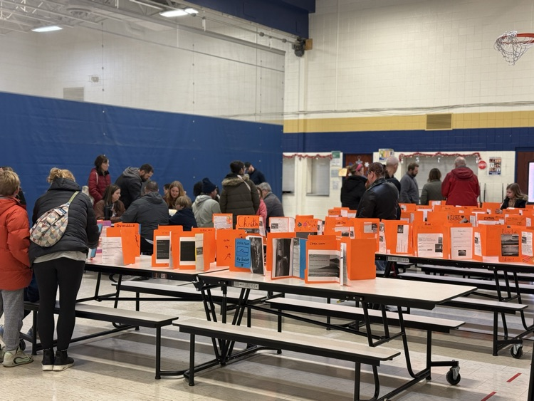 Families reading their child’s work & learning math games
