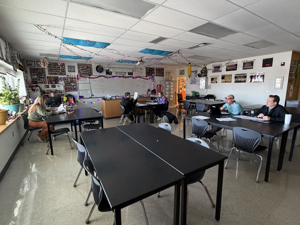 Biology teachers collaborating during PLCs.