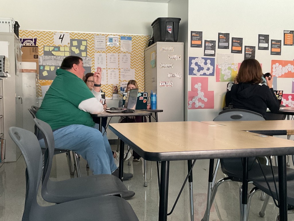 Teachers collaborating on priorities for student success.