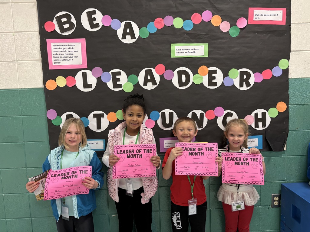 Leader of the month Kindergarten students with their awards