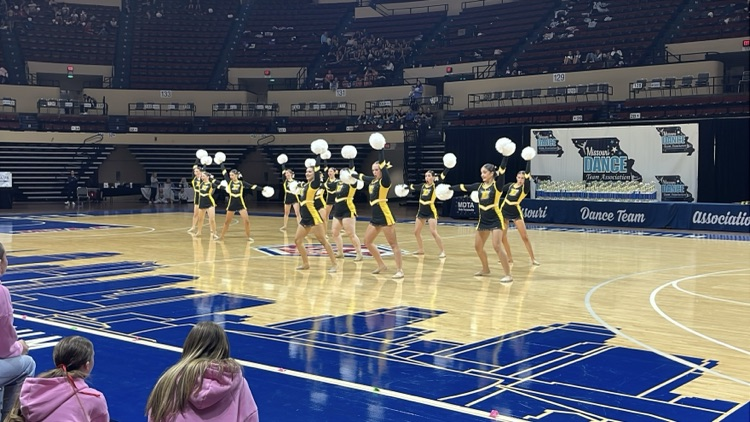 Pom routine on the court